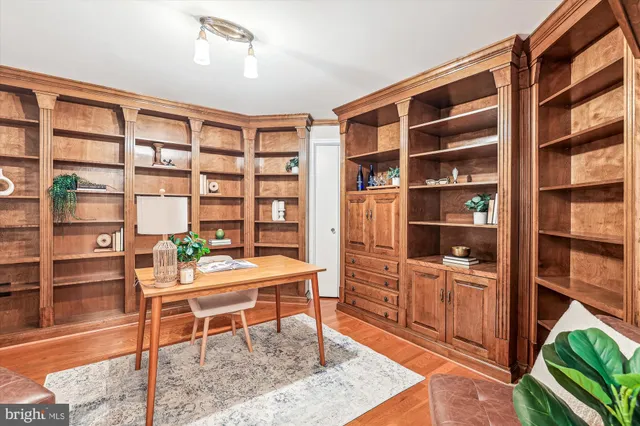 a room with furniture cabinets and a rug