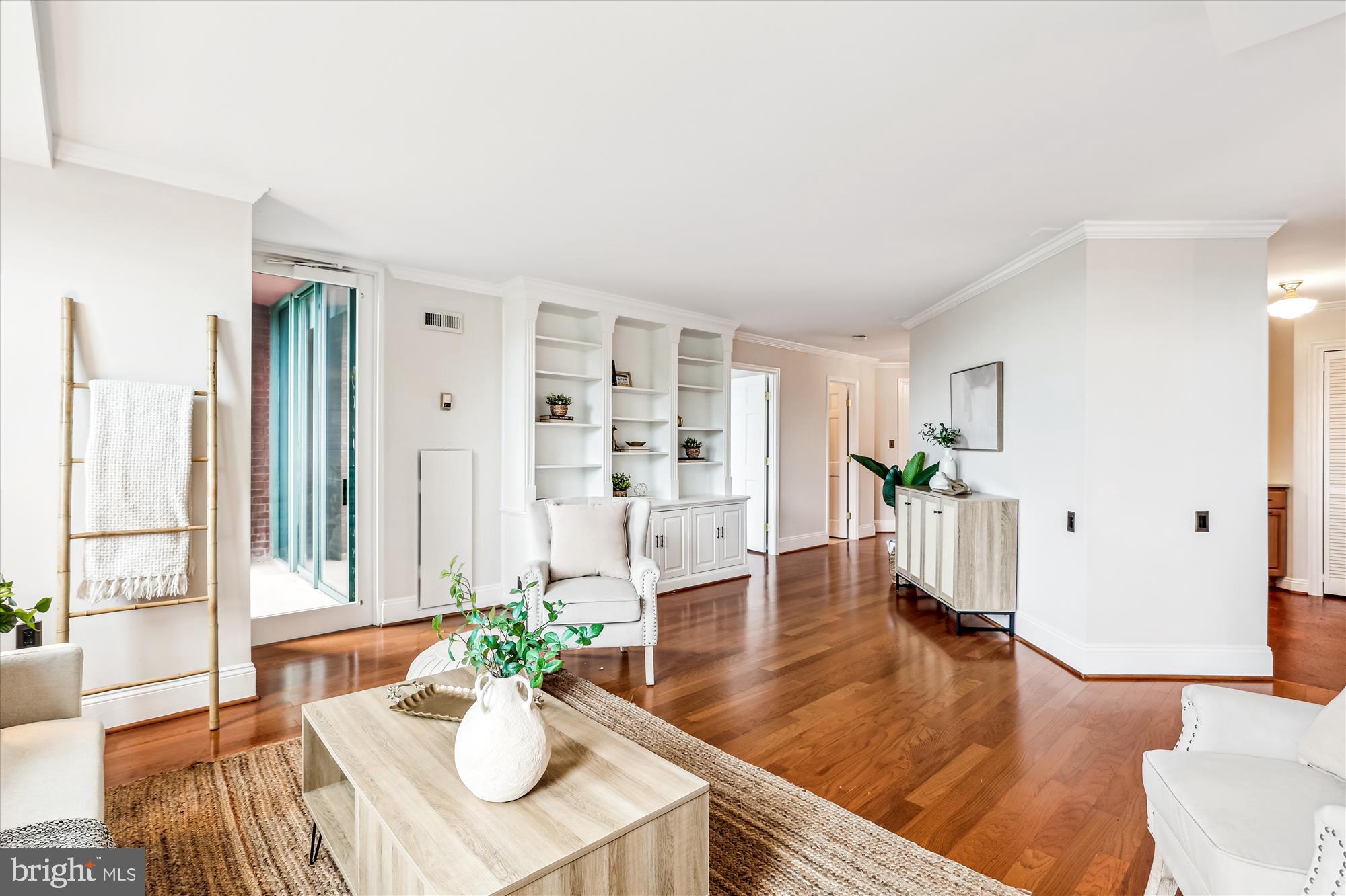 955 26th Street Northwest, Unit 512 Washington, DC 20037 - Photo 4 of 41 a living room with furniture dining table and wooden floor