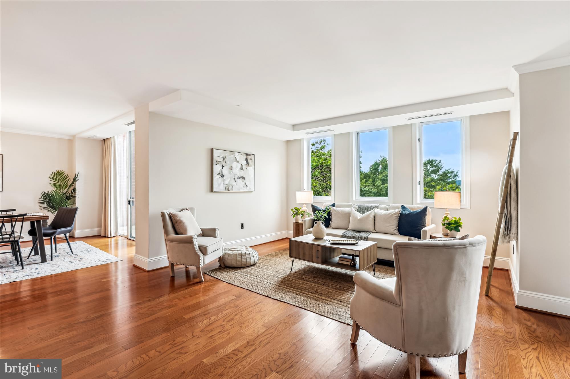 955 26th Street Northwest, Unit 512 Washington, DC 20037 - Photo 5 of 41 a living room with furniture and wooden floor