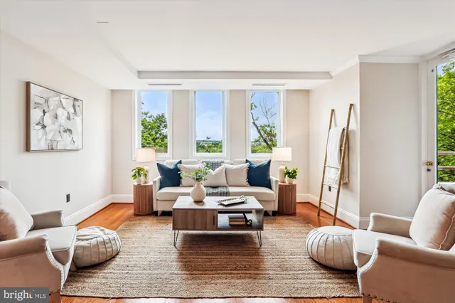 a living room with furniture or couch and a window