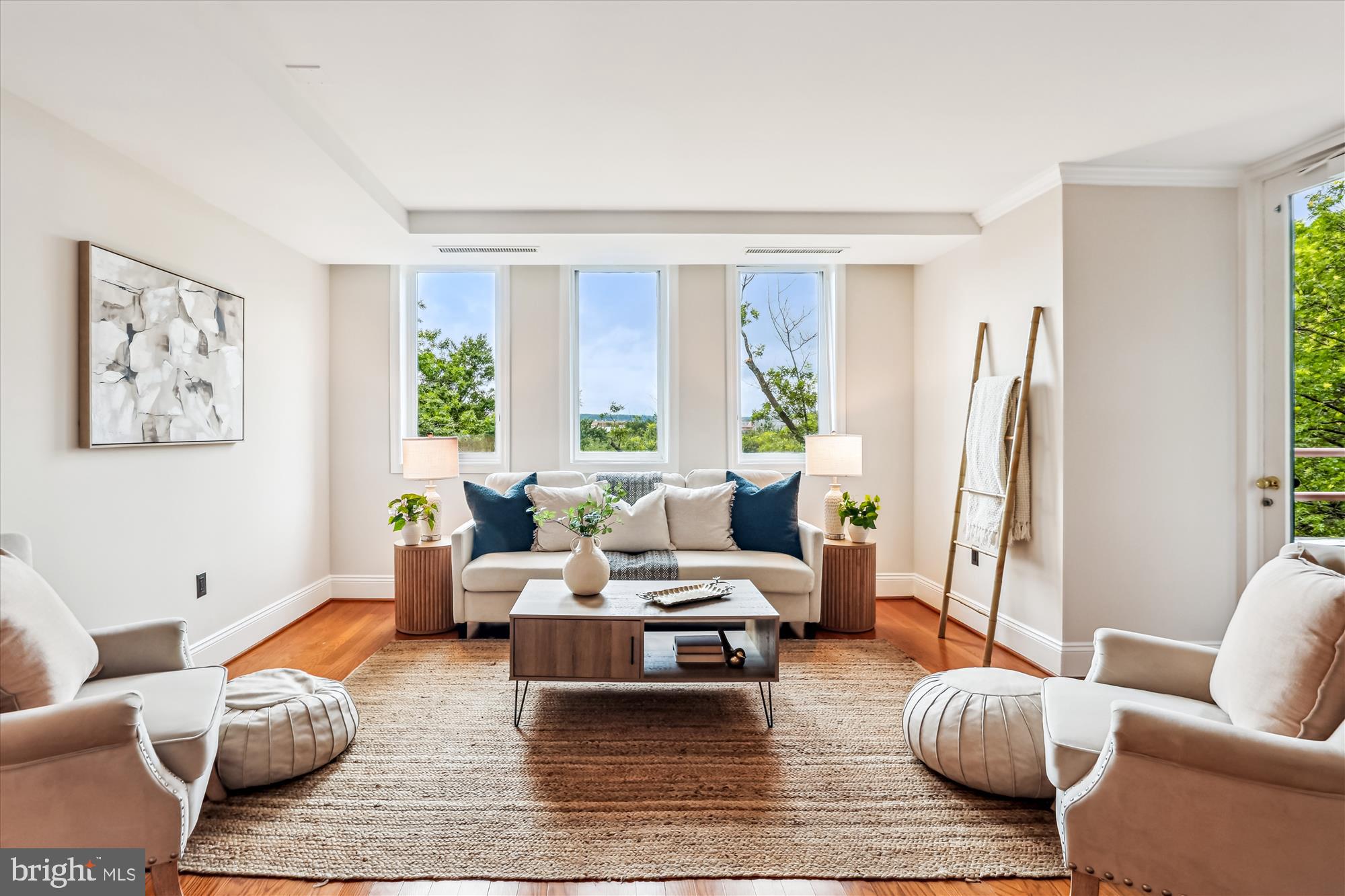 955 26th Street Northwest, Unit 512 Washington, DC 20037 - Photo 6 of 41 a living room with furniture or couch and a window