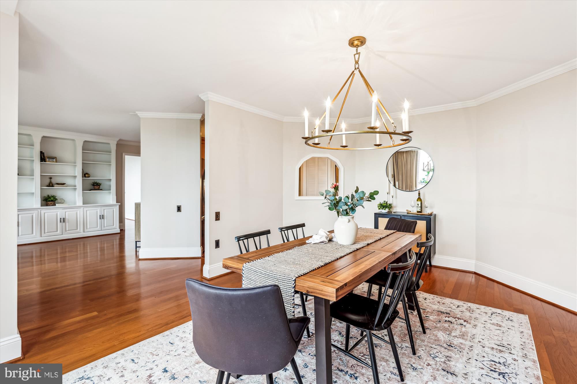 955 26th Street Northwest, Unit 512 Washington, DC 20037 - Photo 9 of 41 a view of a dining room with furniture and wooden floor