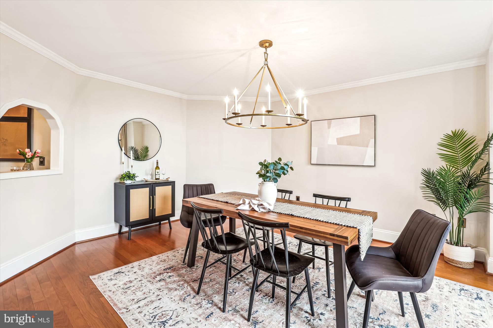 955 26th Street Northwest, Unit 512 Washington, DC 20037 - Photo 10 of 41 a view of a dining room with furniture and wooden floor