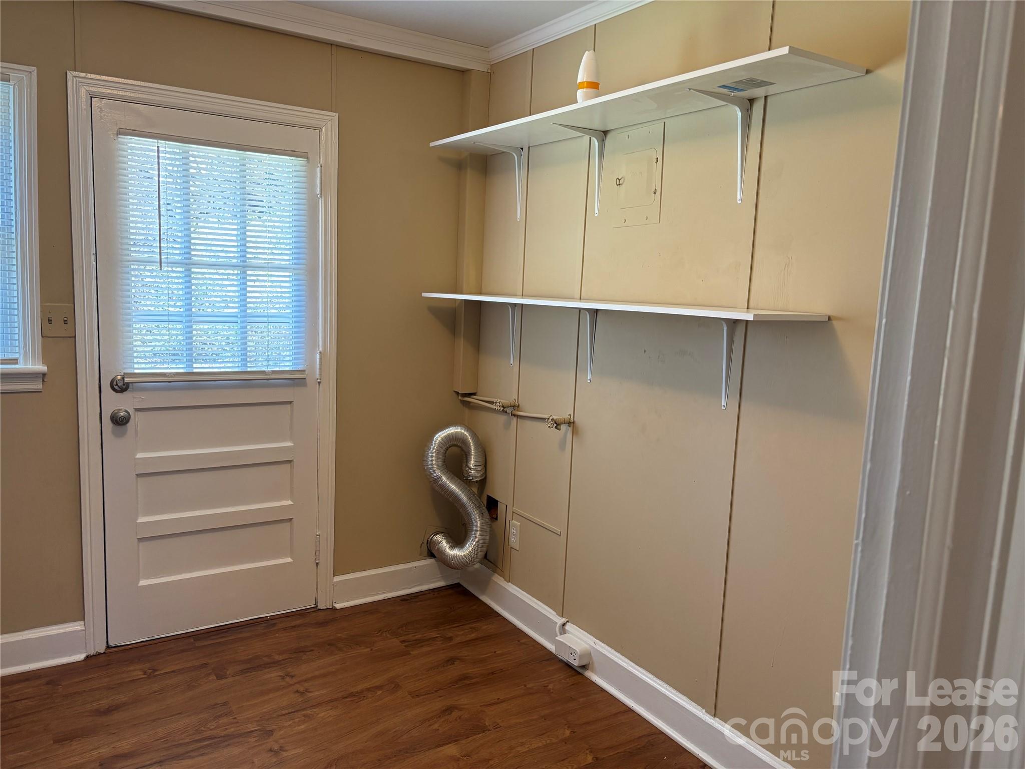324 East Rhodes Street Lincolnton, NC 28092 - Photo 10 of 10 a view of an empty room with a window