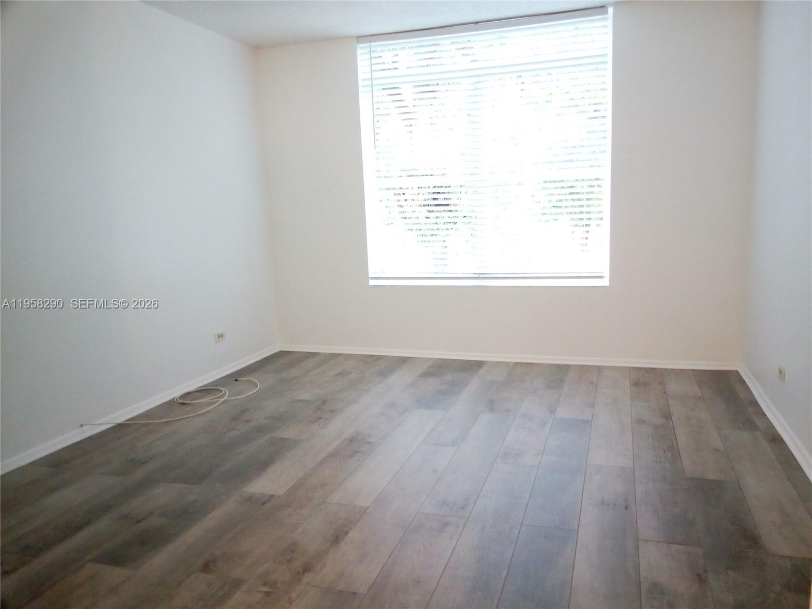 3720 Inverrary Drive, Unit 2S Lauderhill, FL 33319 - Photo 33 of 49 an empty room with a window
