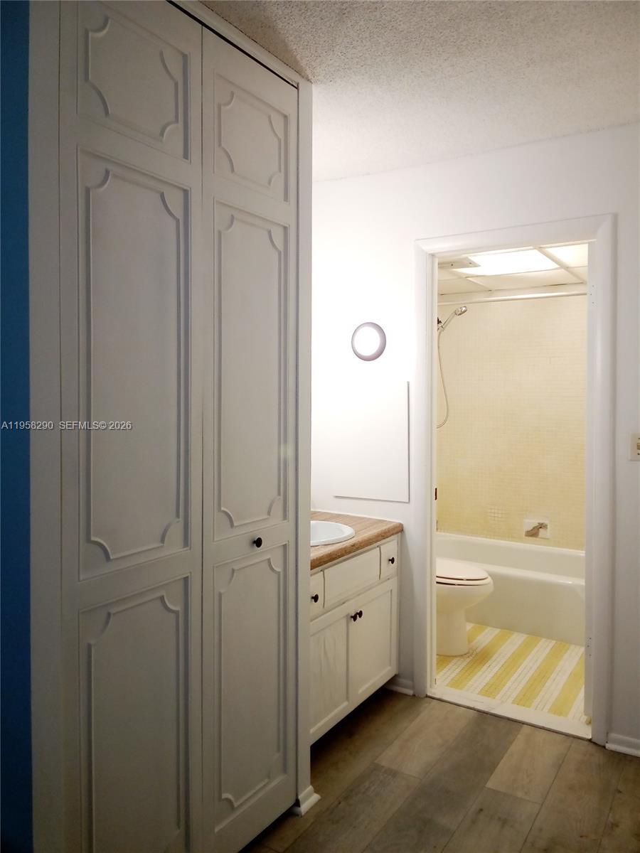 3720 Inverrary Drive, Unit 2S Lauderhill, FL 33319 - Photo 36 of 49 a bathroom with a bathtub and a shower