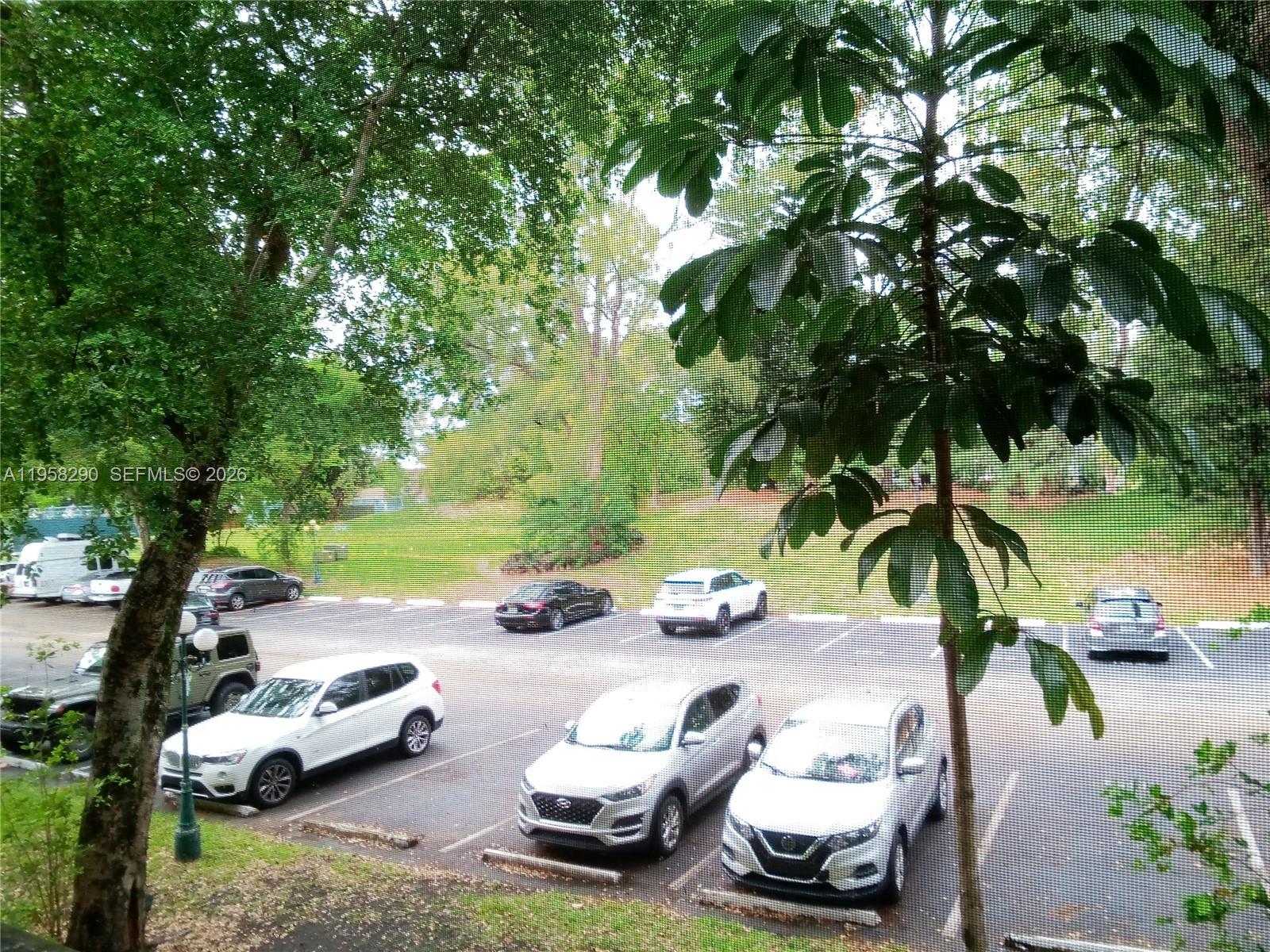 3720 Inverrary Drive, Unit 2S Lauderhill, FL 33319 - Photo 48 of 49 1 assigned parking in front of the building entrance & guest parking