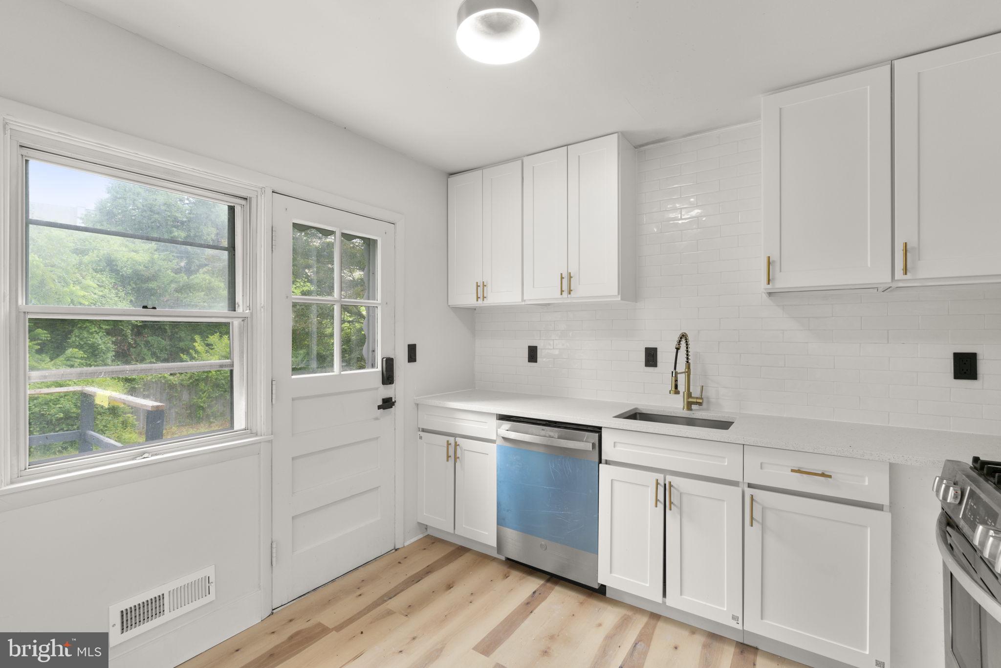 577 Brook Road Towson, MD 21286 - Photo 18 of 49 Bright and airy modern kitchen space.