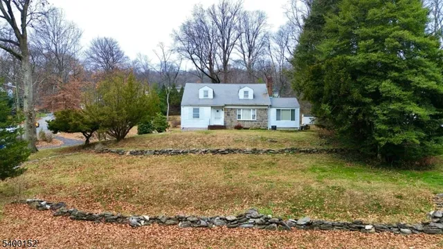 a view of a yard and a house