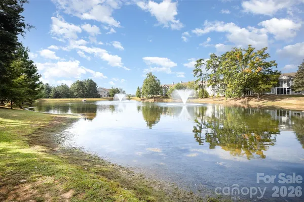 a view of a lake with a big yard