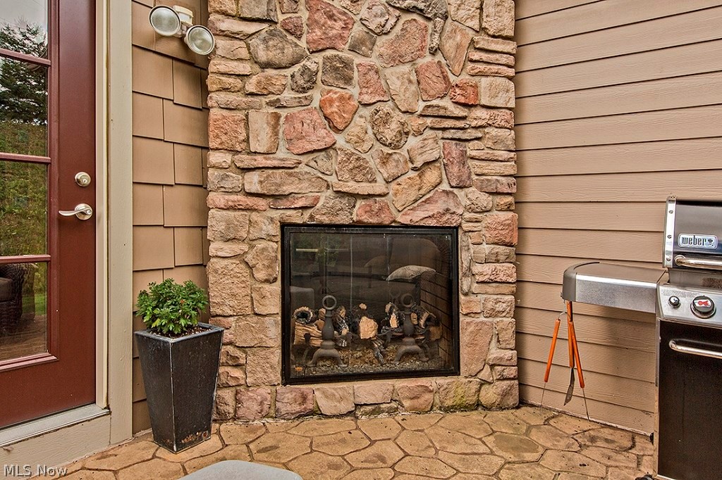 3375 Legends Way Cleveland, OH 44124 - Photo 30 of 33 Concrete Stamped Patio with Two Sided Remote Gas Fireplace