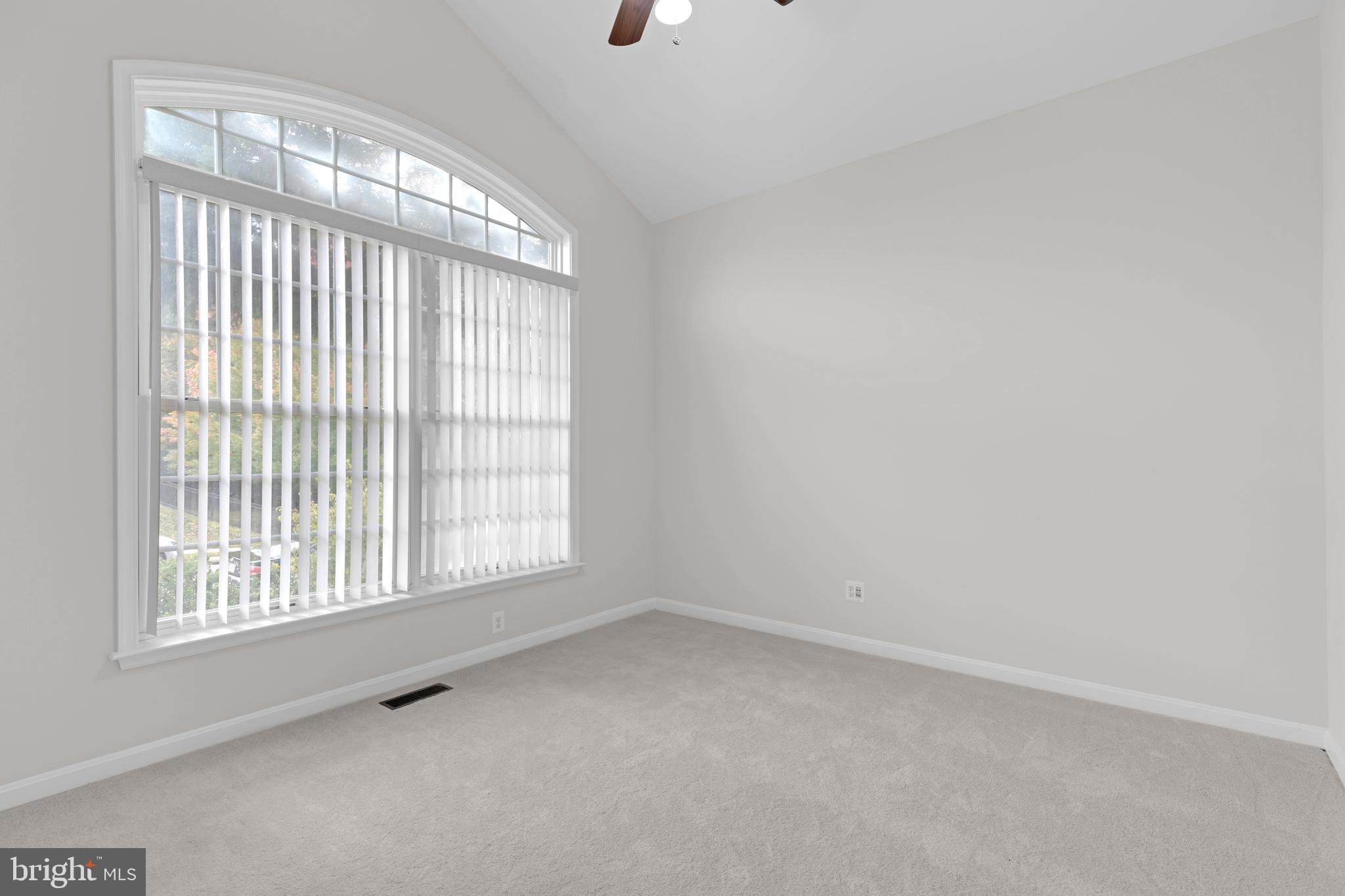 8566 Brickshire Lane Manassas, VA 20112 - Photo 19 of 59 an empty room with windows