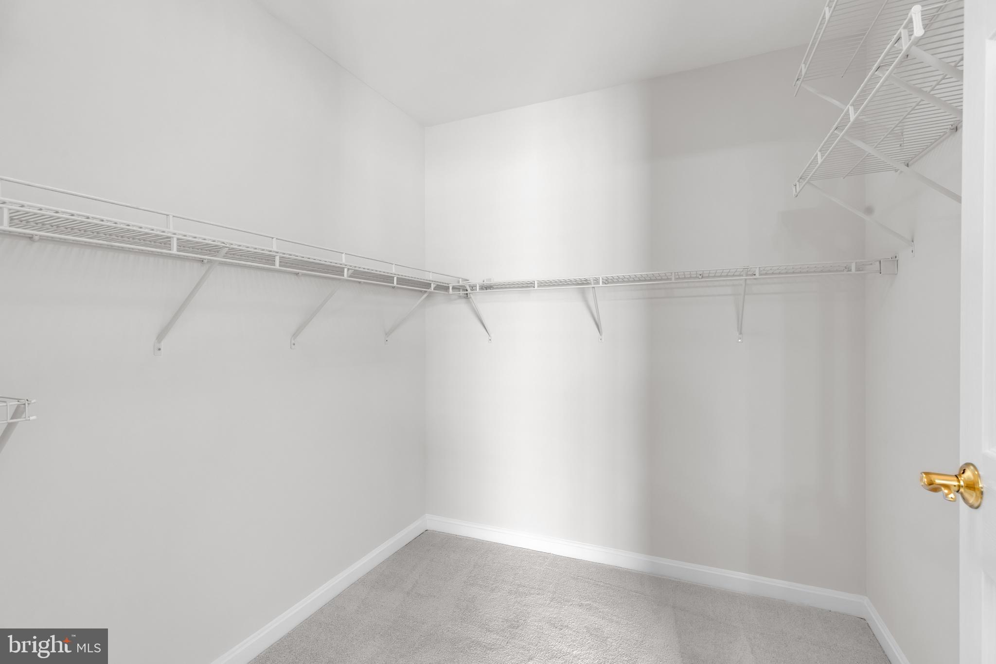 8566 Brickshire Lane Manassas, VA 20112 - Photo 24 of 59 a view of a room with racks on the wall