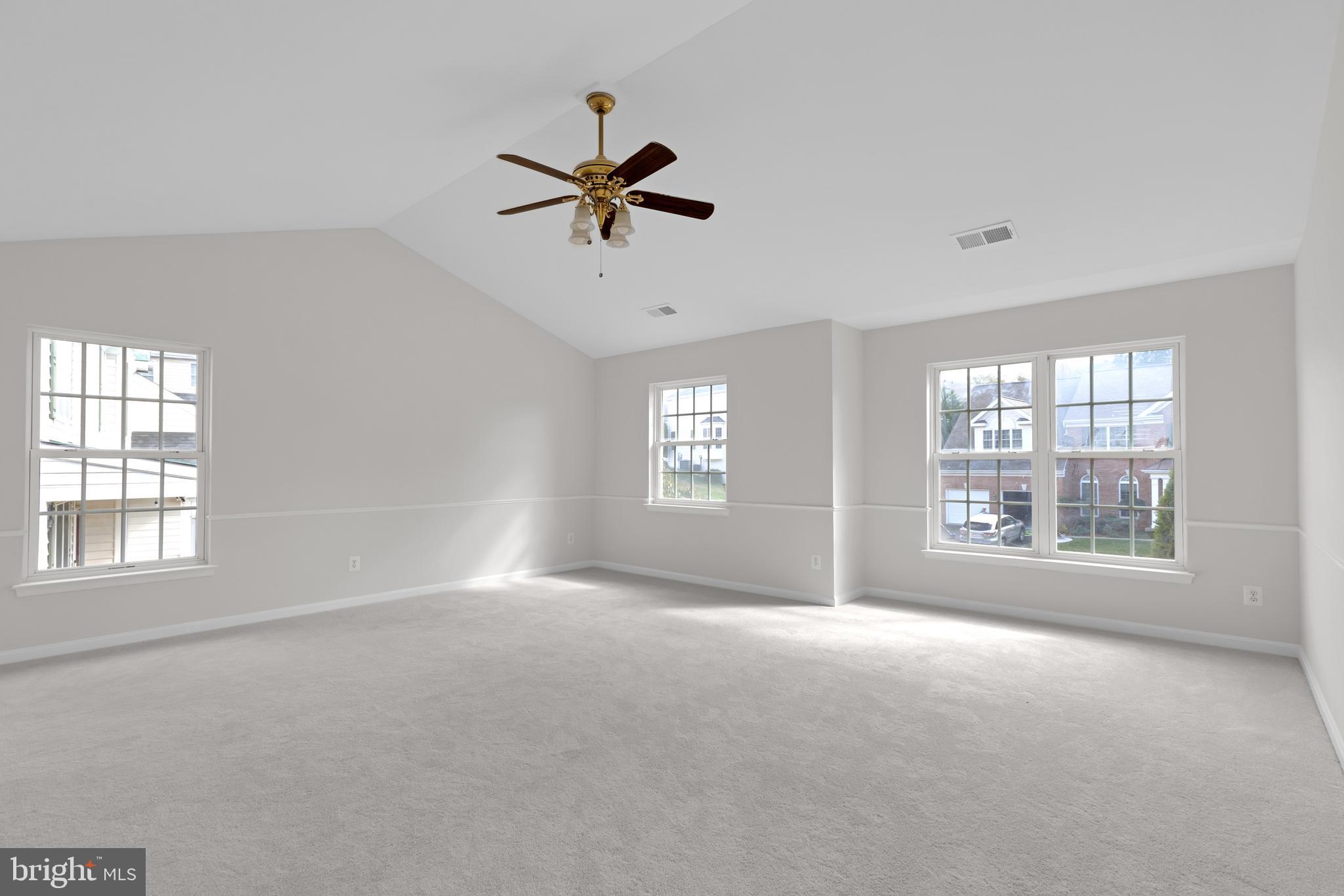 8566 Brickshire Lane Manassas, VA 20112 - Photo 25 of 59 a view of an empty room with a window