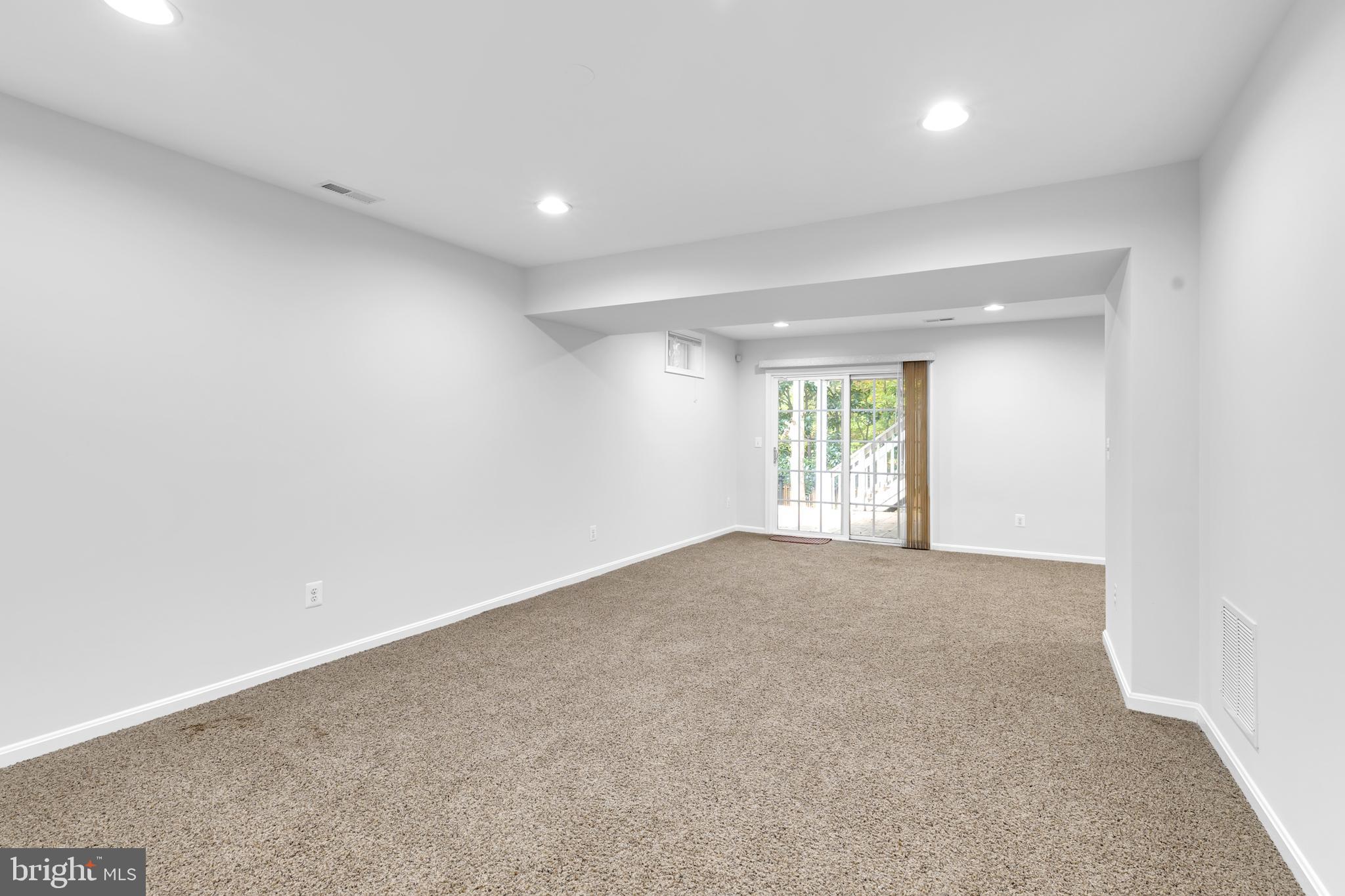 8566 Brickshire Lane Manassas, VA 20112 - Photo 40 of 59 a view of an empty room with a window