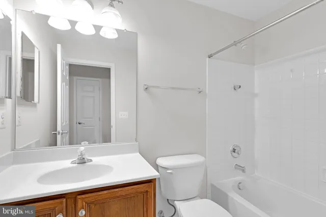 a view of an empty room with a large window