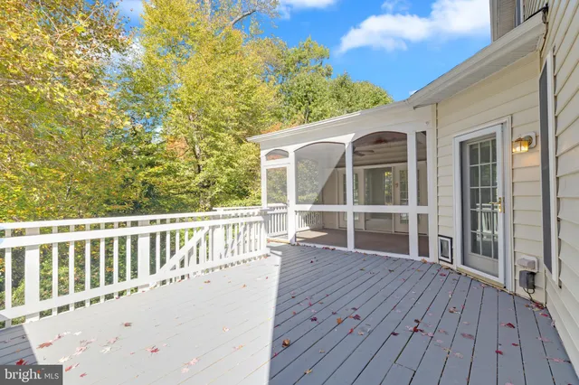 an aerial view of a house with a ocean view