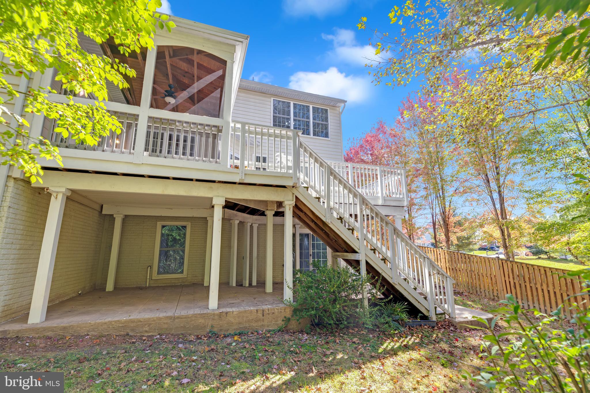8566 Brickshire Lane Manassas, VA 20112 - Photo 51 of 59 a view of a house with a yard