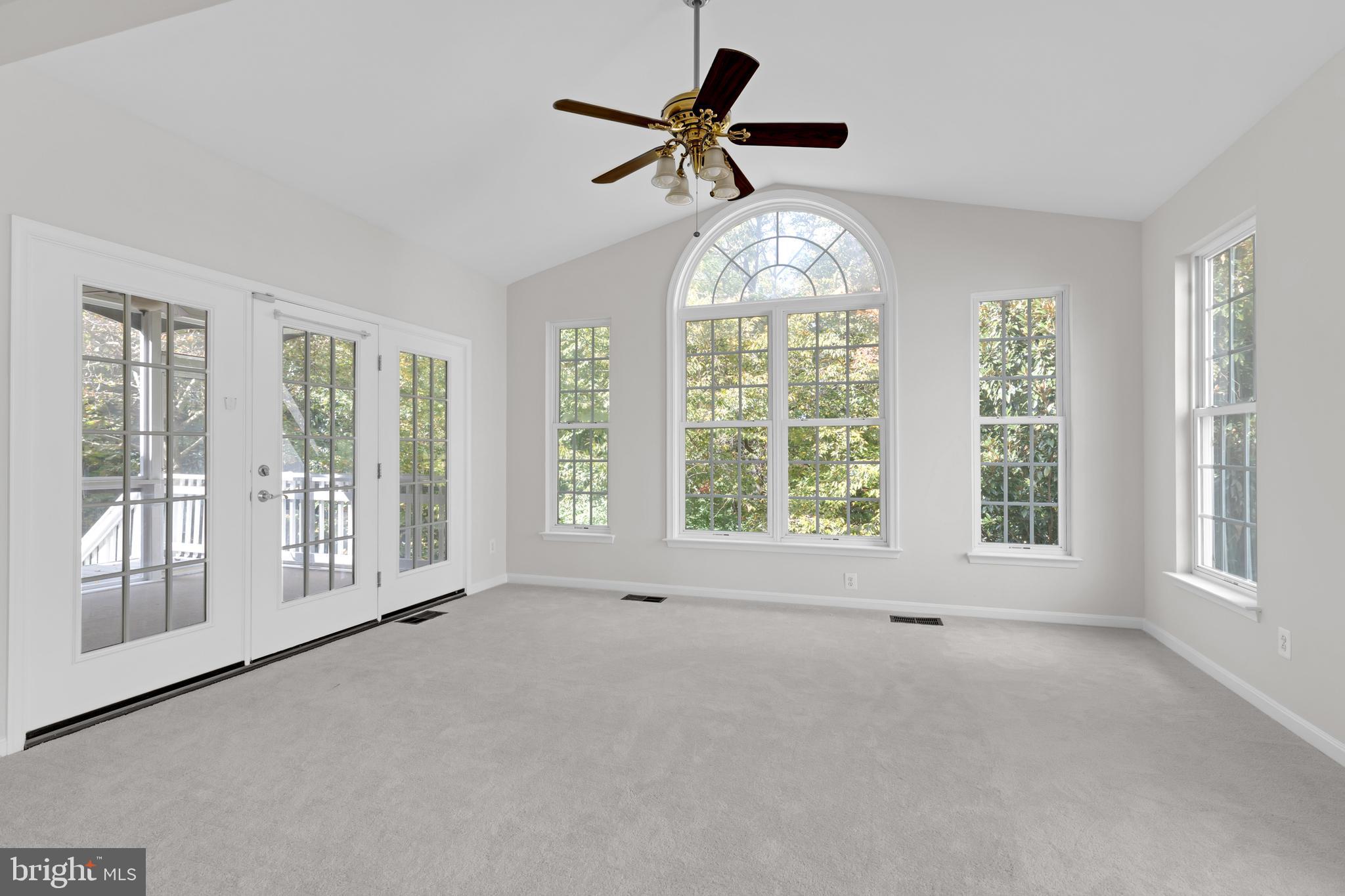 8566 Brickshire Lane Manassas, VA 20112 - Photo 8 of 59 a view of an empty room with a window