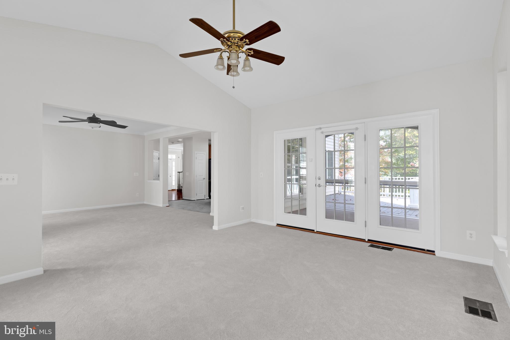 8566 Brickshire Lane Manassas, VA 20112 - Photo 10 of 59 a view of an empty room with a window