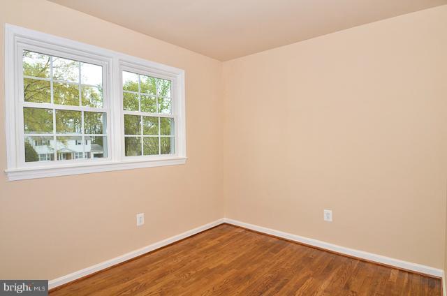 6902 Huntsman Boulevard Springfield, VA 22153 - Photo 3 of 27 an empty room with a window
