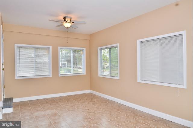 6902 Huntsman Boulevard Springfield, VA 22153 - Photo 23 of 27 a view of an empty room with a window