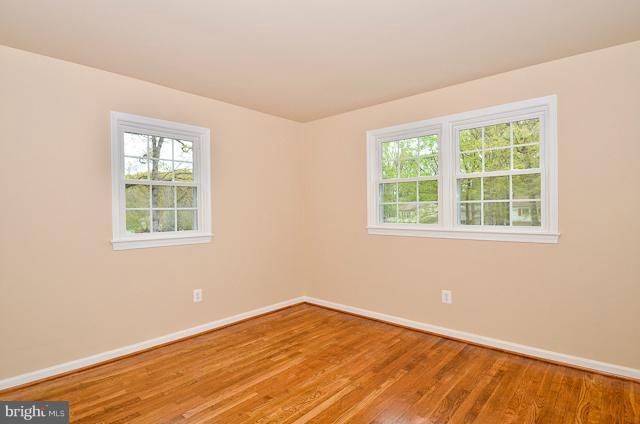 6902 Huntsman Boulevard Springfield, VA 22153 - Photo 26 of 27 an empty room with a window