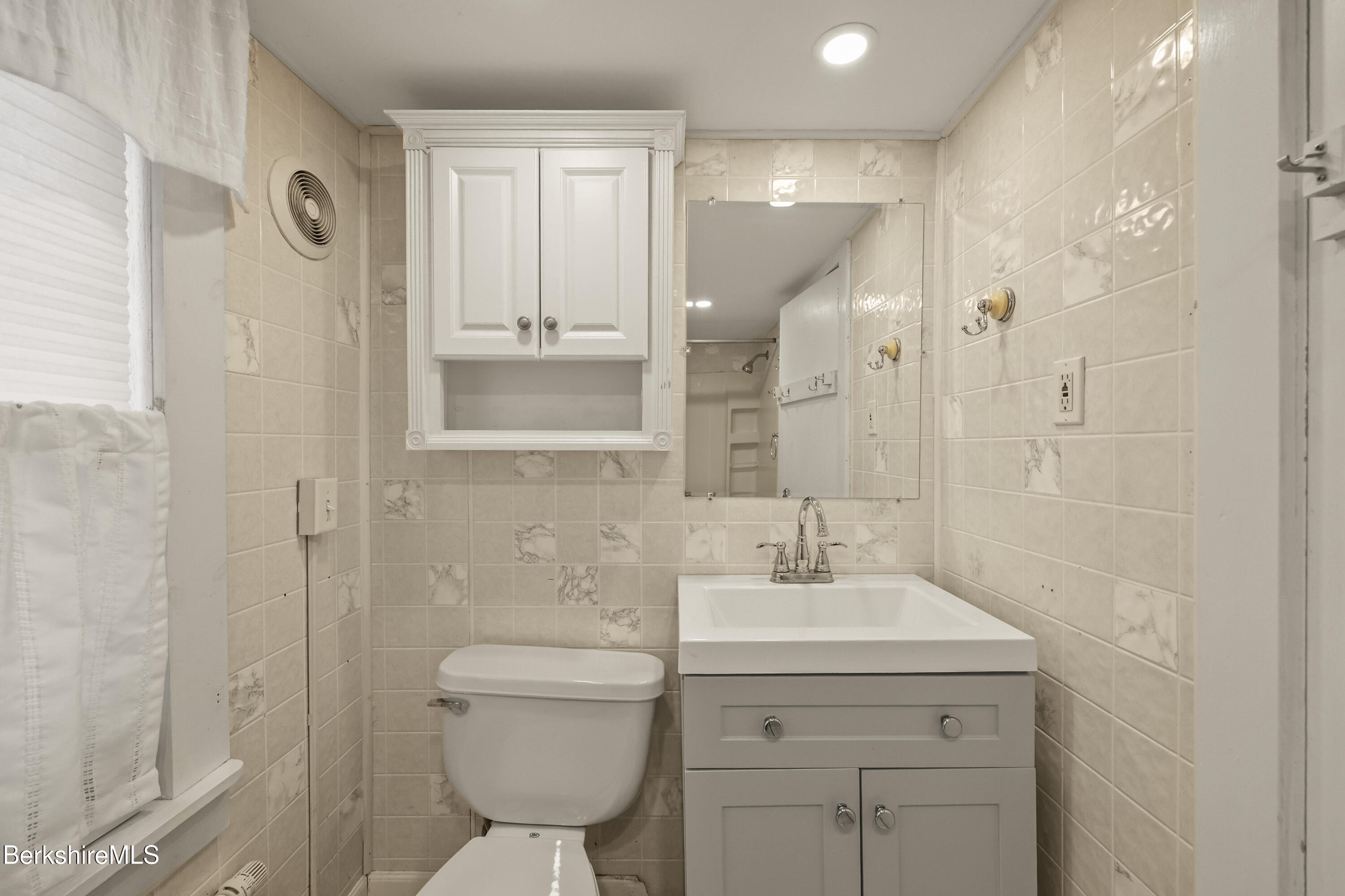 2801 State Road Richmond, MA 01254 - Photo 25 of 46 a bathroom with a toilet sink and shower