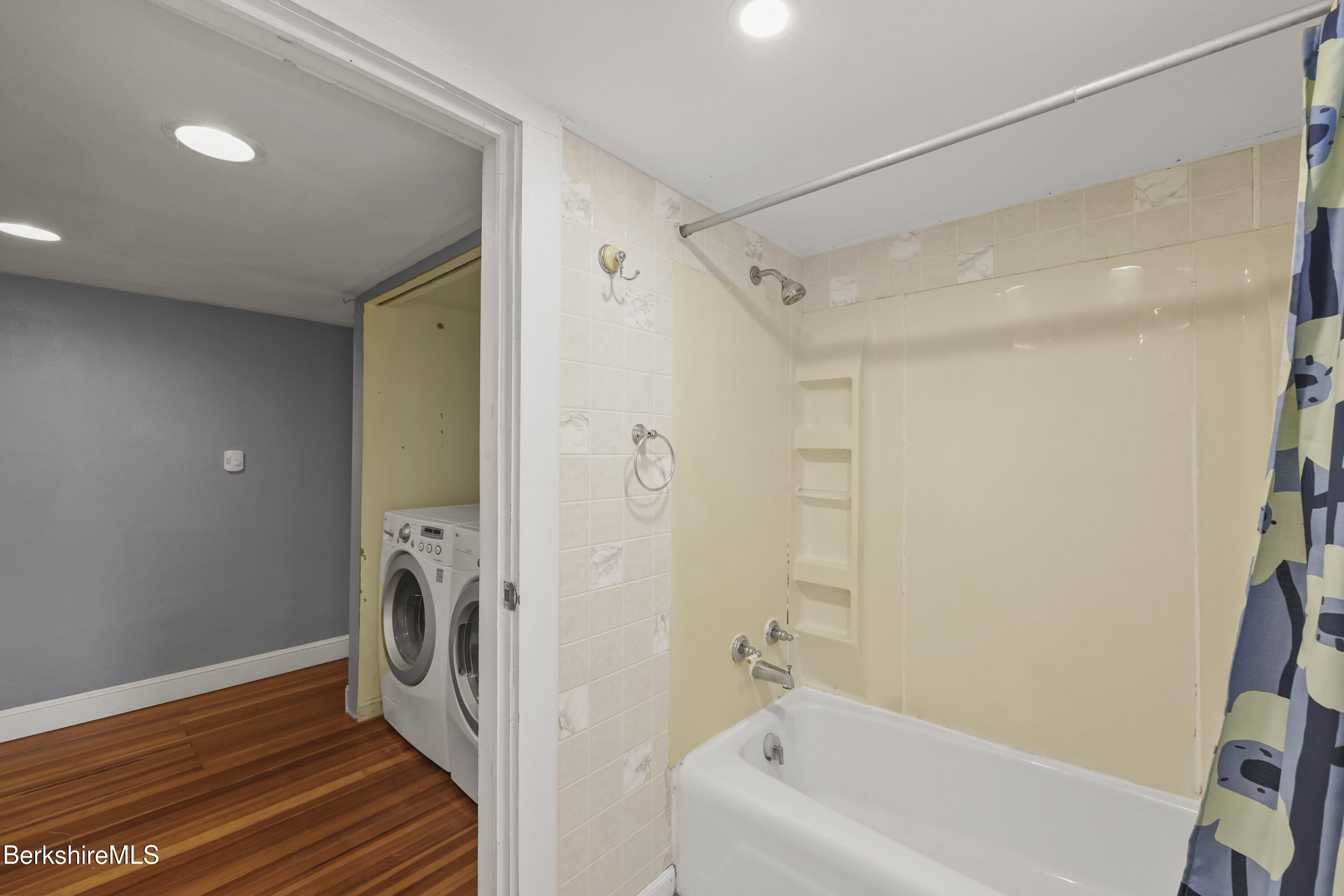 2801 State Road Richmond, MA 01254 - Photo 26 of 46 a bathroom with a bathtub and a shower