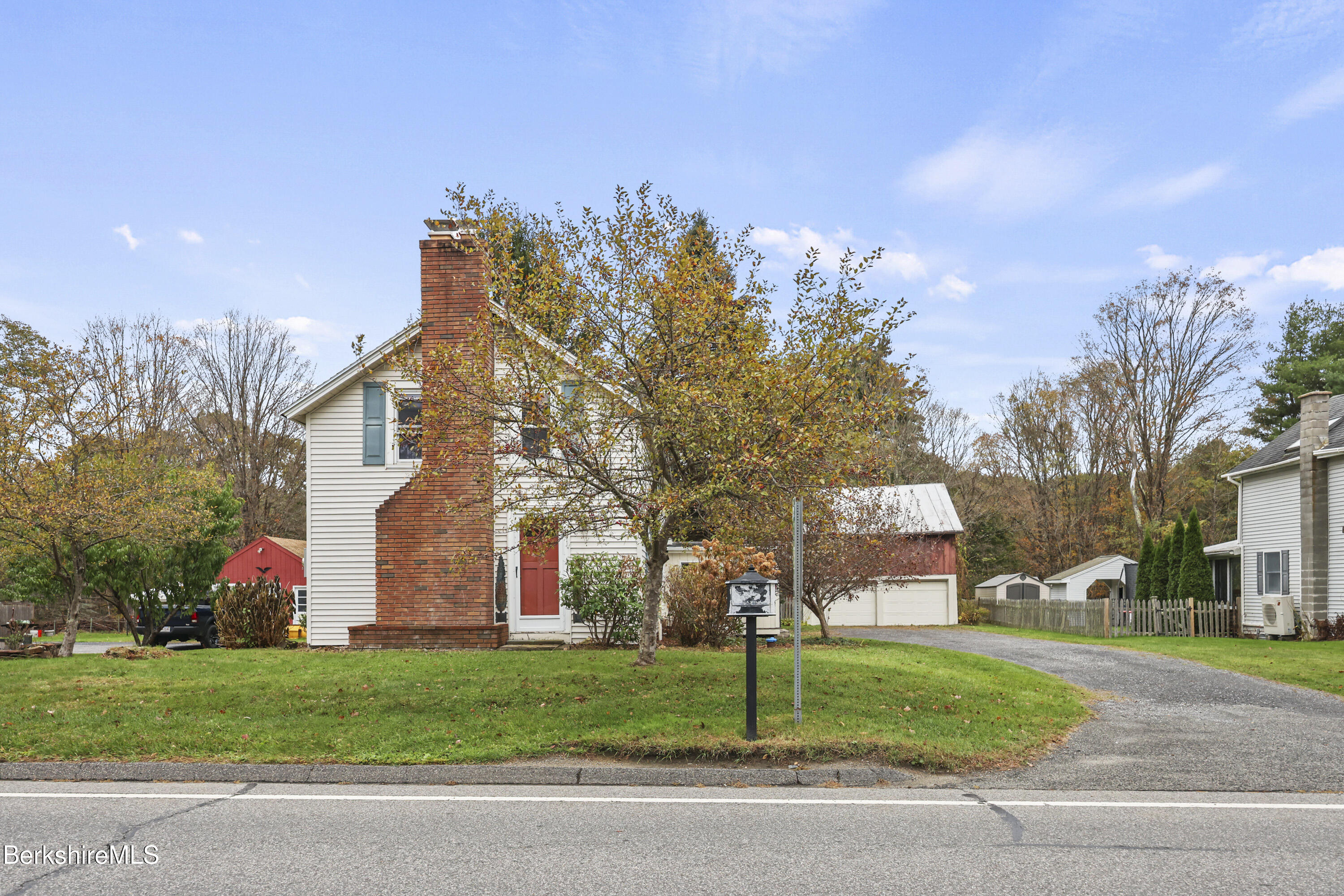 2801 State Road Richmond, MA 01254 - Photo 3 of 46 a view of a house with a yard and tree s