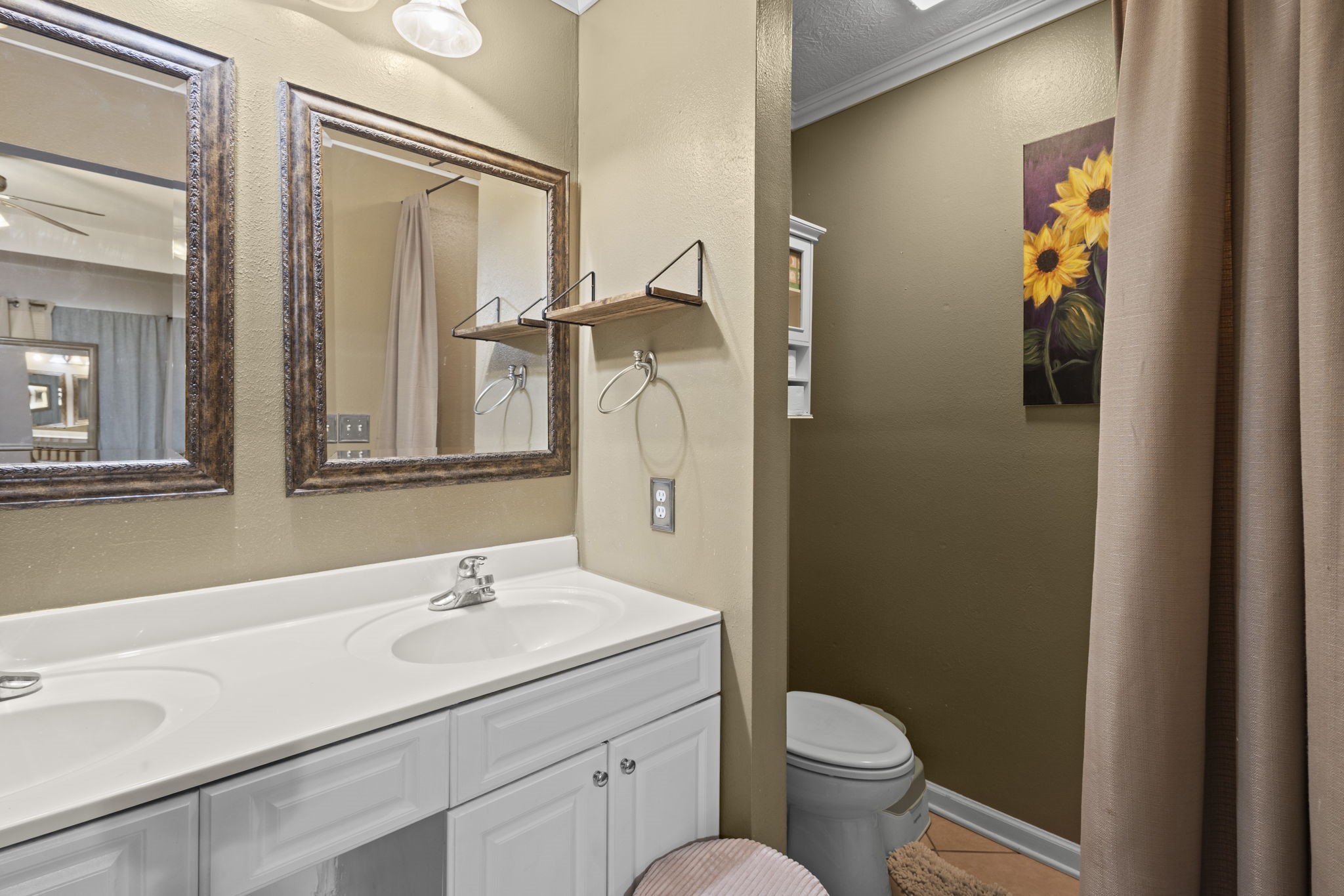 269 East Chance Cutoff Lumberton, TX 77657 - Photo 17 of 24 a bathroom with a toilet sink and mirror