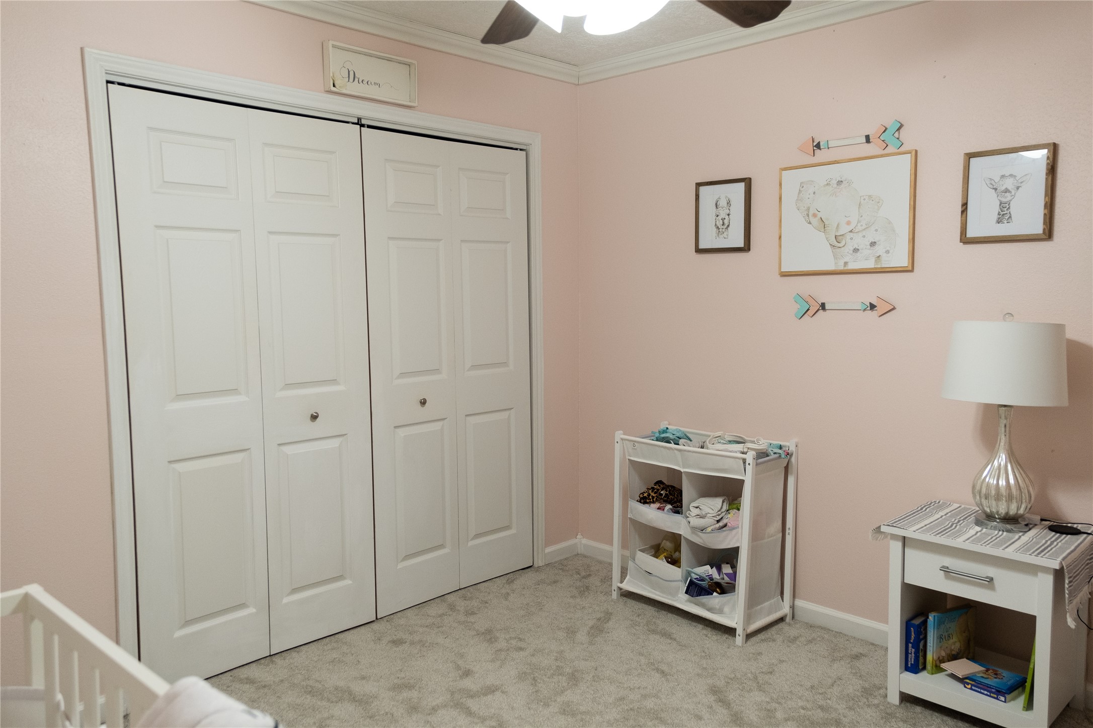 269 East Chance Cutoff Lumberton, TX 77657 - Photo 19 of 24 a room with a fireplace and a chandelier fan