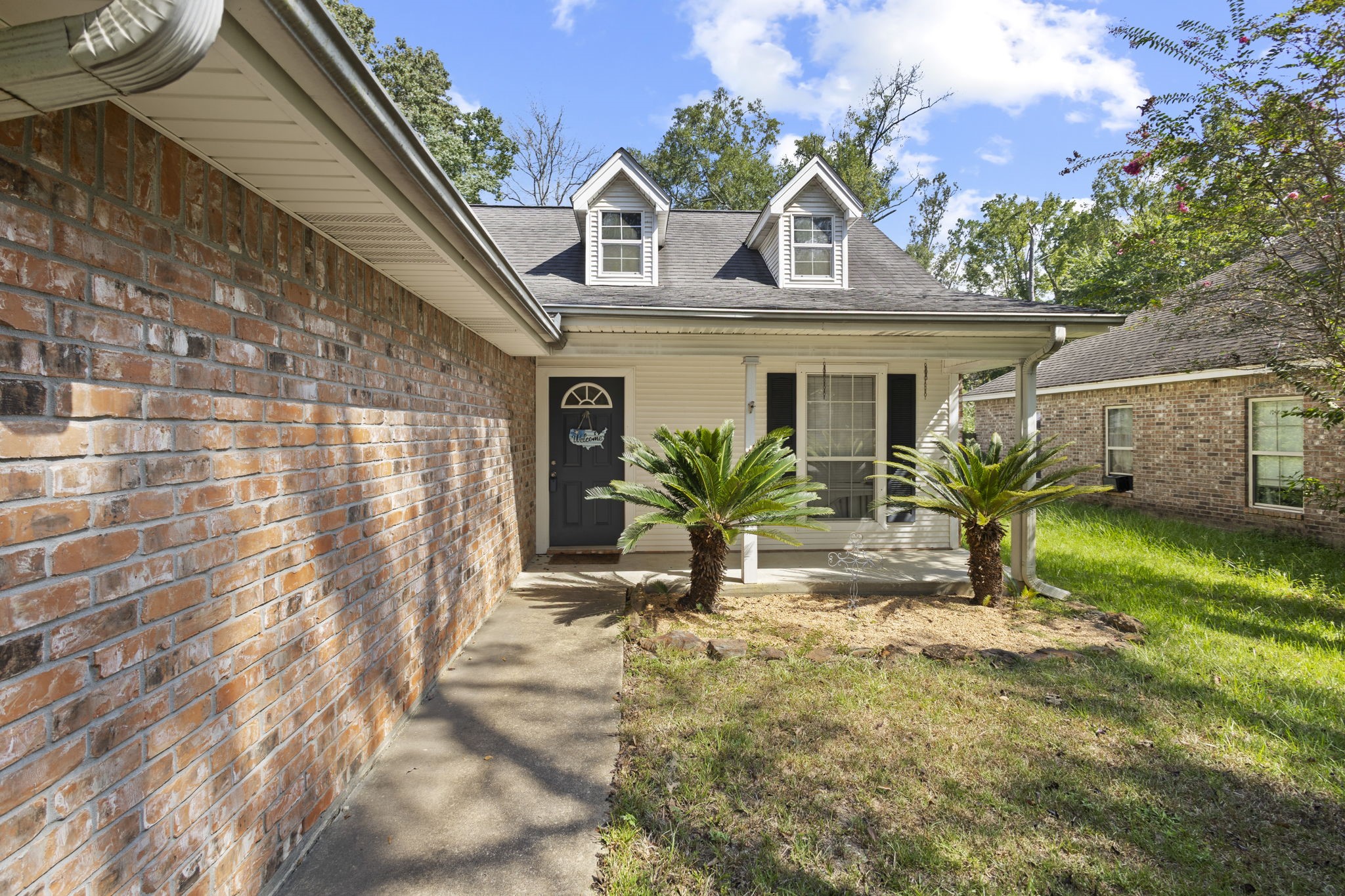 269 East Chance Cutoff Lumberton, TX 77657 - Photo 2 of 24 a view of house with a garden
