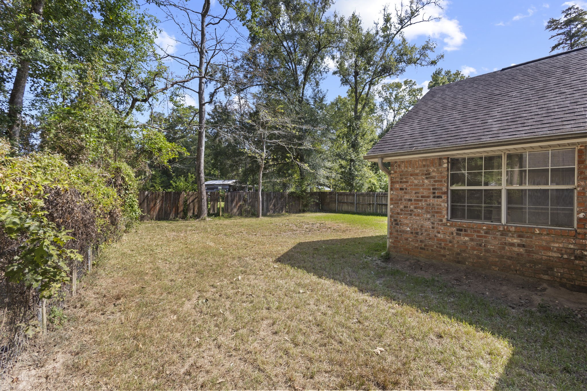 269 East Chance Cutoff Lumberton, TX 77657 - Photo 23 of 24 a view of a house with backyard and tree