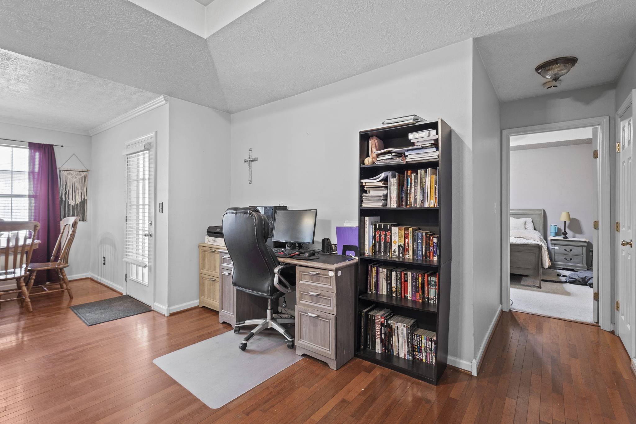 269 East Chance Cutoff Lumberton, TX 77657 - Photo 8 of 24 a view of a workspace with furniture and wooden floor