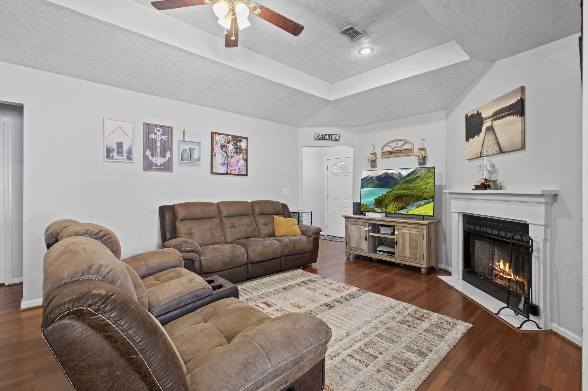 269 East Chance Cutoff Lumberton, TX 77657 - Photo 10 of 24 a living room with furniture and a fireplace