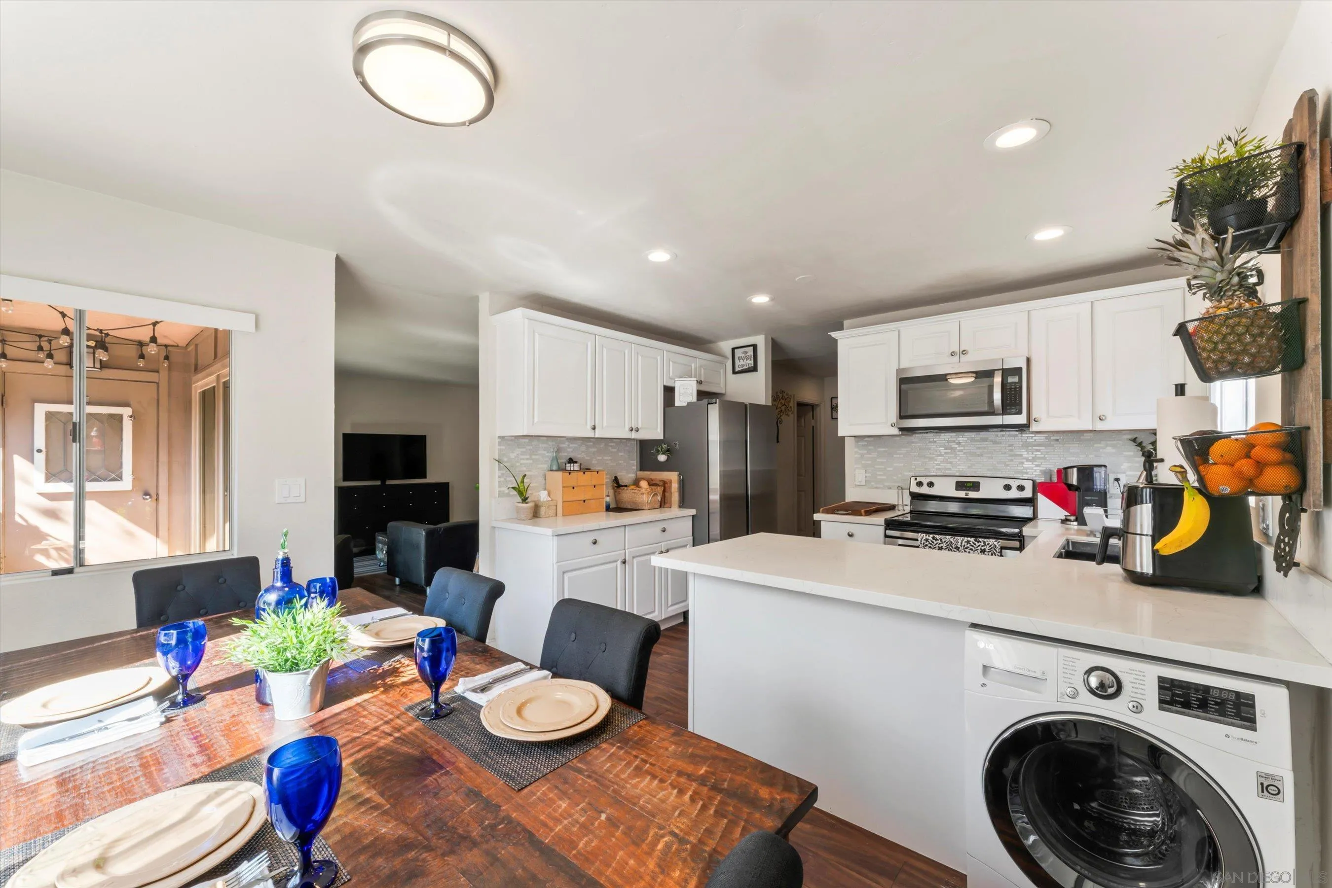 a view of kitchen dining table and chairs