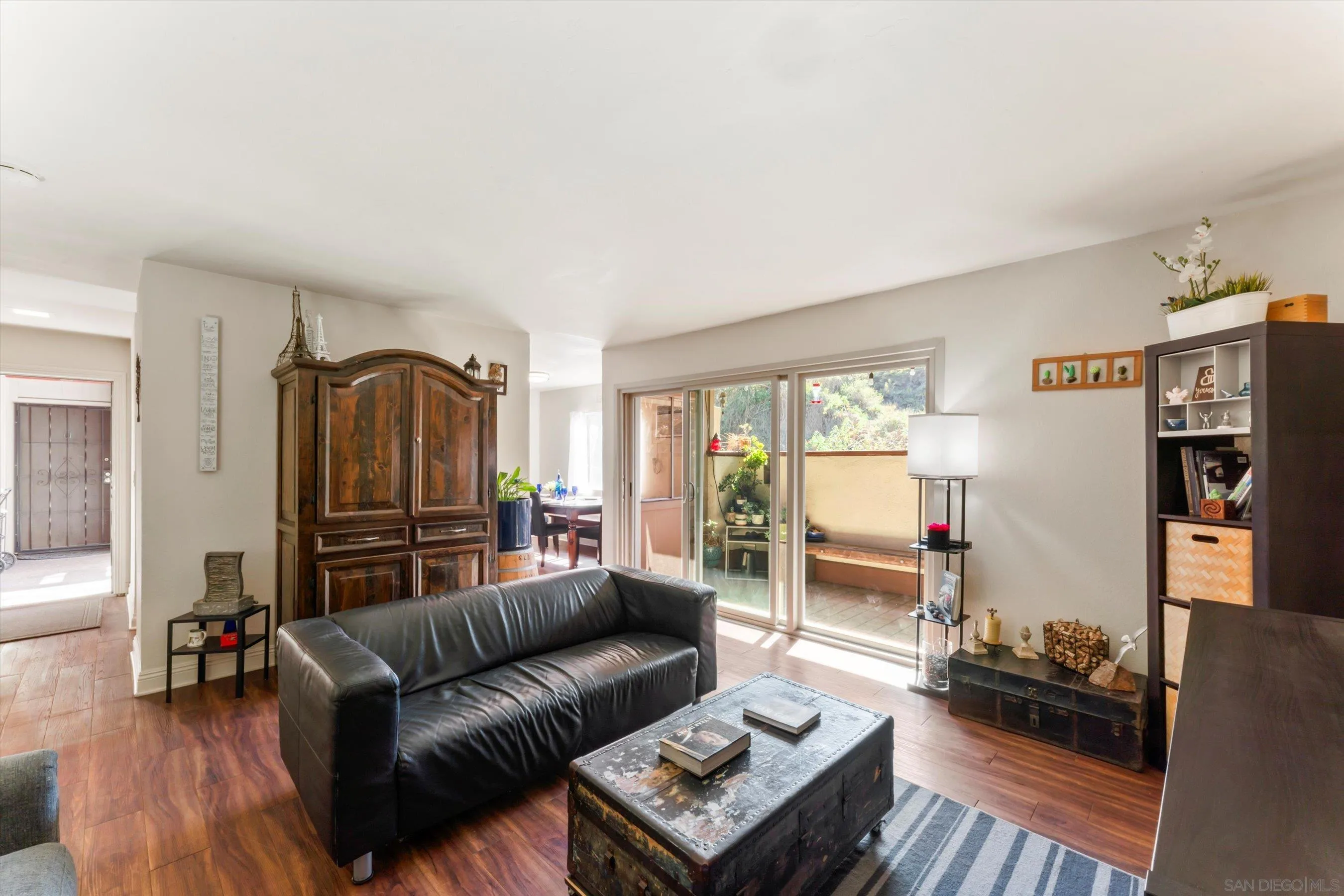 5483 Adobe Falls Road, Unit 7 San Diego, CA 92120 - Photo 9 of 20 a living room with furniture and a window