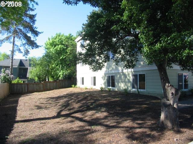 13320 Southwest Allen Boulevard, Unit 310 Beaverton, OR 97005 - Photo 18 of 18 a front view of a house with garden