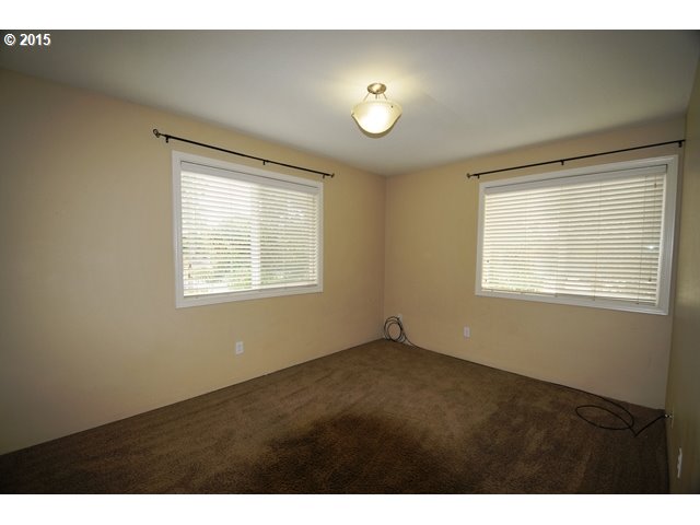 13320 Southwest Allen Boulevard, Unit 310 Beaverton, OR 97005 - Photo 10 of 18 a view of an empty room with a window