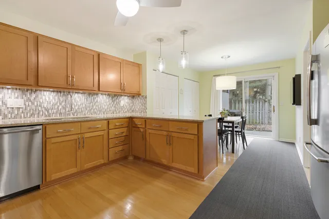 a kitchen with sink cabinets and furniture