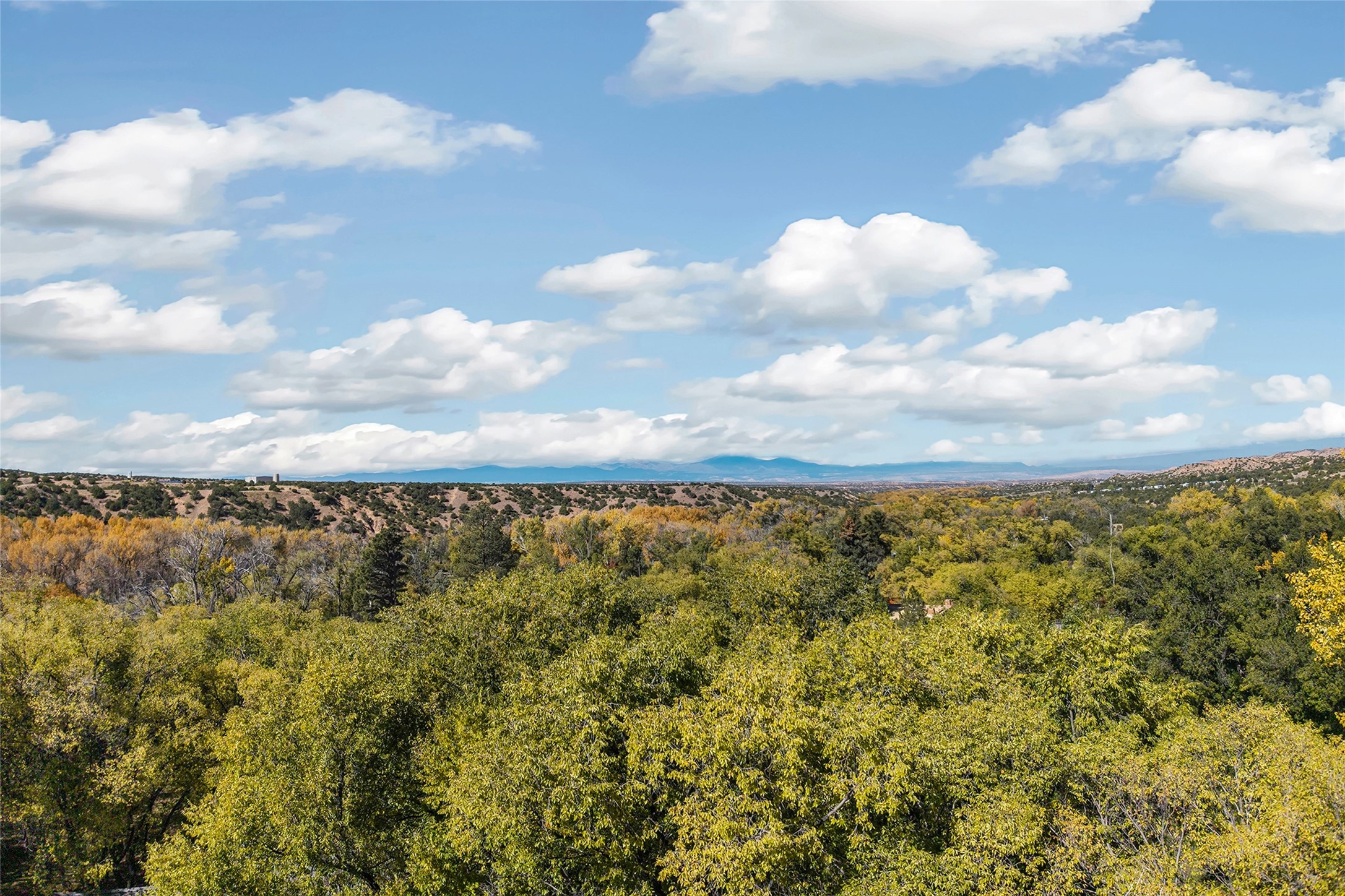 9 Old Coach Road Santa Fe, NM 87506 - Photo 42 of 42 Jemez Mountain Beyond the Tesuque Valley