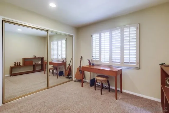 a view of a livingroom with furniture