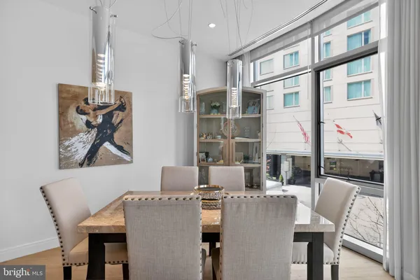a dining room with furniture and window