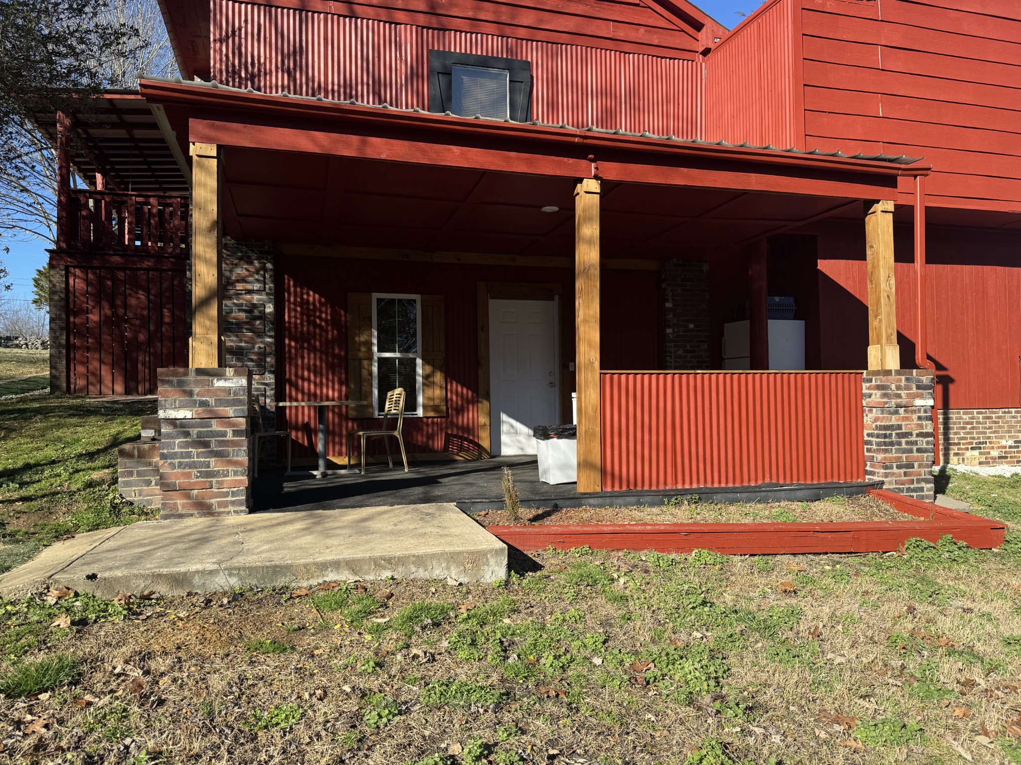 10795 Back Piney Road Bon Aqua, TN 37025 - Photo 11 of 64 a view of a car park in front of house