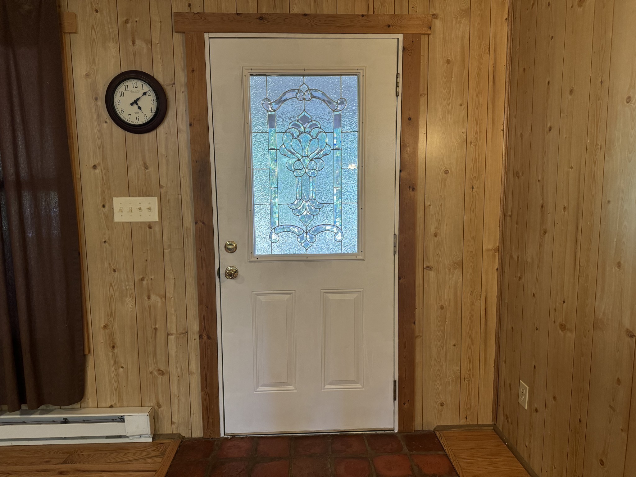 10795 Back Piney Road Bon Aqua, TN 37025 - Photo 14 of 64 an empty room with a wooden door
