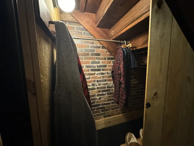 a white toilet sitting next to a bathroom sink