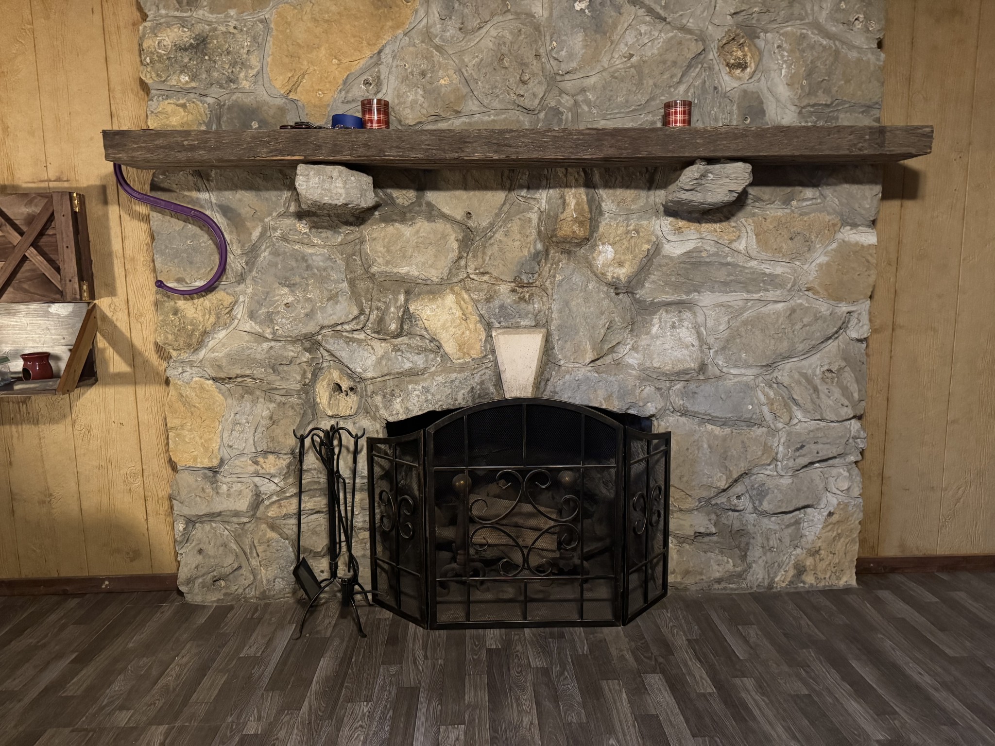 10795 Back Piney Road Bon Aqua, TN 37025 - Photo 38 of 64 a room with a fireplace