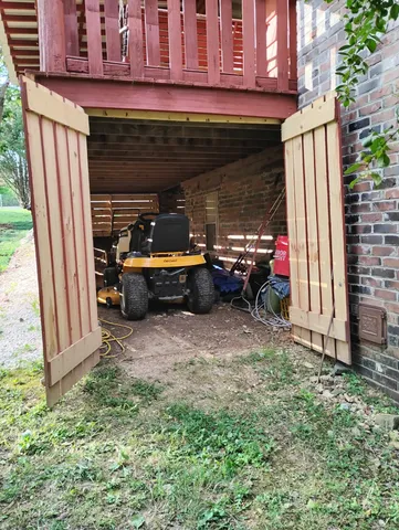 a view of a car park in front of house