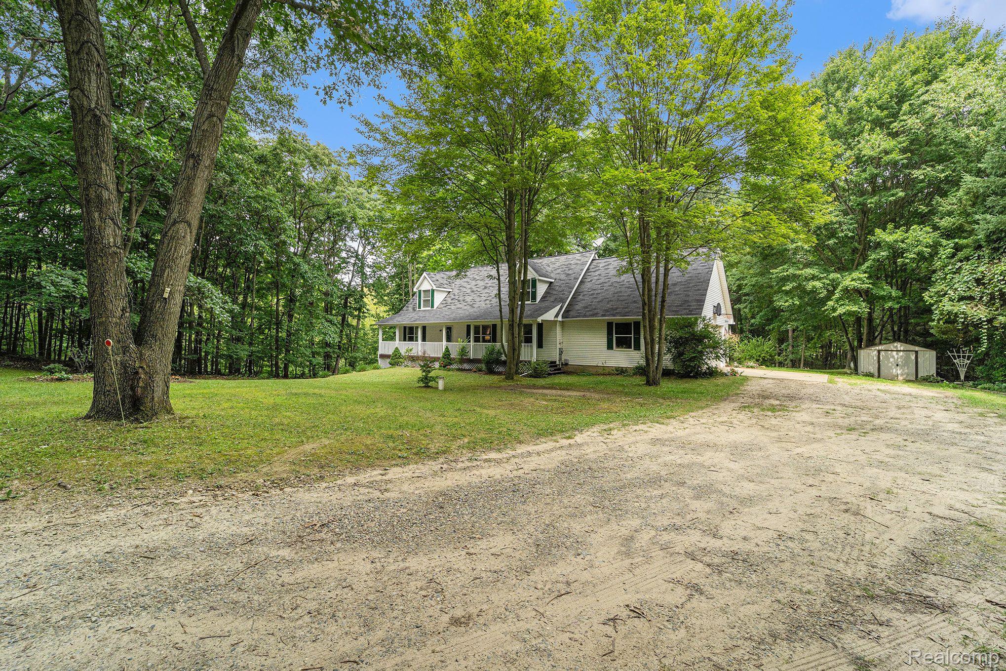 Nestled on 1.52 beautiful acres